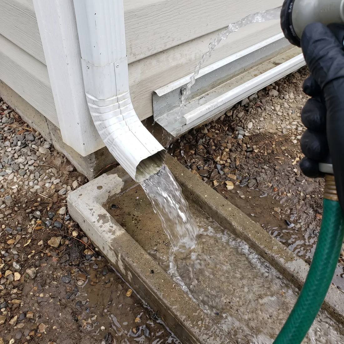 Reflekt technician doing a final check along the roof edge and gutters in Boise
